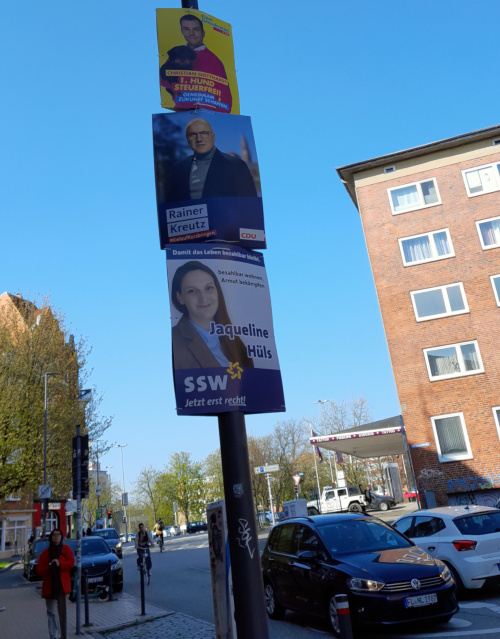 Plakate von SSW, CDU, FDP